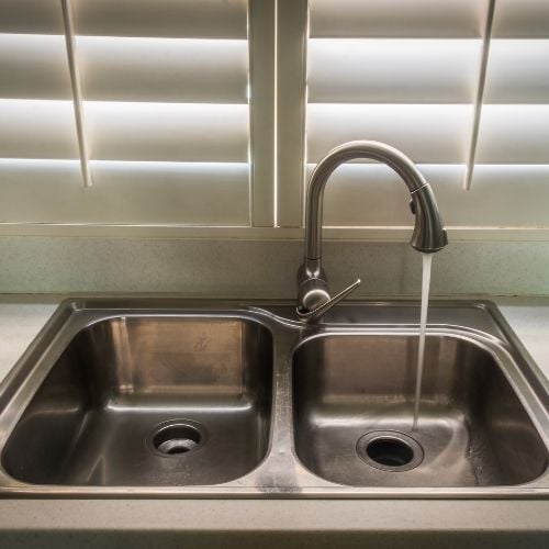 Why Is My Garbage Disposal Making a Humming Sound-run cold water-call a pro-Niceleys heating cooling appliance repair