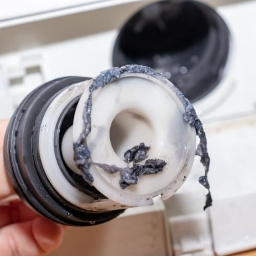 Why Your Front-Load Washer Smells in Northern Kentucky Homes- drain pump filter -Niceleys Appliance Repair Heating and Cooling
